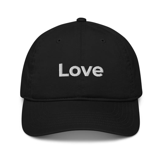 Front of black dad hat with the word 'Love' embroidered in white thread. 100% organic certified cotton. 