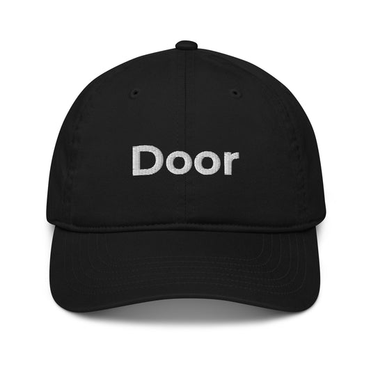 Front of black baseball hat with the word 'Door' embroidered in white thread. 100% organic certified cotton. 