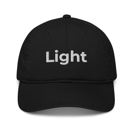 Front of black dad hat with the word 'Light' embroidered in white thread. 100% organic certified cotton. 