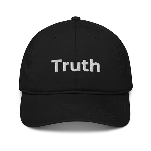Front of black dad hat with the word 'Truth' embroidered in white thread. 100% organic certified cotton. 