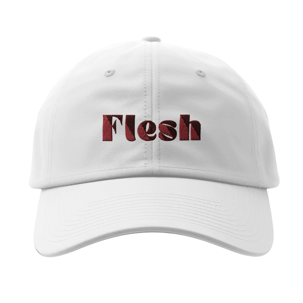 Men's Flexfit 6277 cotton hat with 'Flesh' in red text. Athletic and sporty style. 