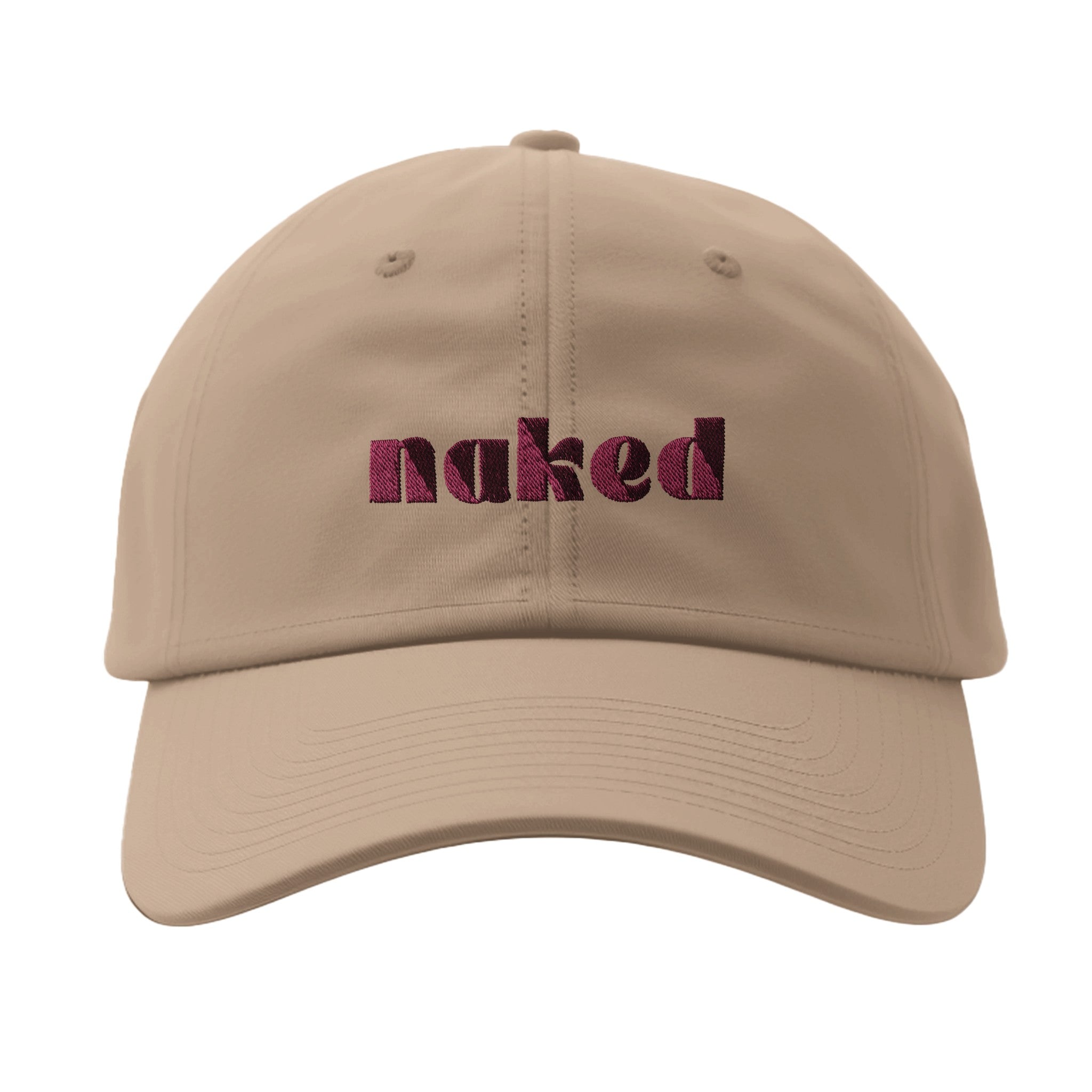Front of women's beige Flexfit 6277 cap with pink lettering.